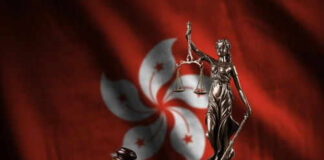 Lady Justice scales gavel book Hong Kong flag