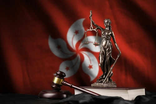 Lady Justice scales gavel book Hong Kong flag