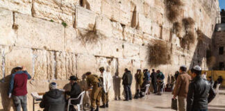 People praying at the Western Wall in Jerusalem