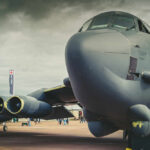 Close-up view of a military aircraft with visible jet engines