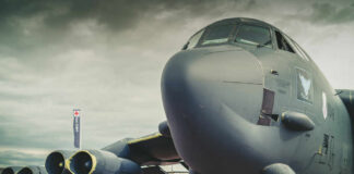 Close-up view of a military aircraft with visible jet engines