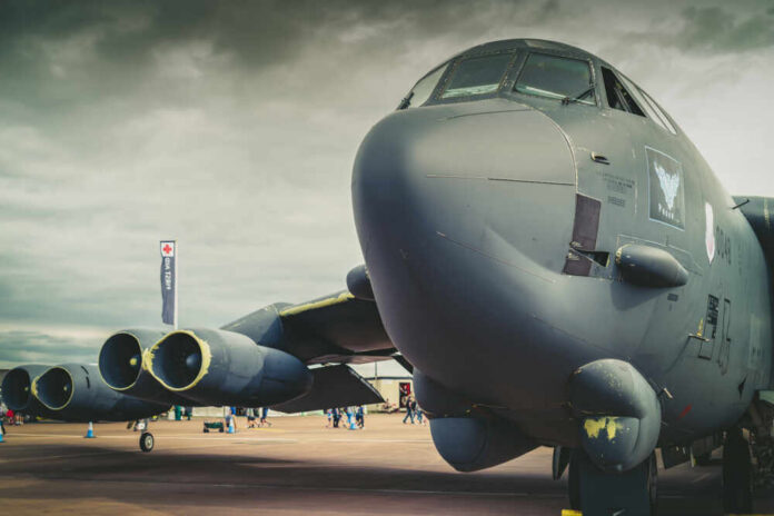 shutterstock_1554928199.jpg Close-up view of a military aircraft with visible jet engines