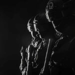 Congresswoman’s Guard Killed – Vetting Failure Uncovered Silhouetted tactical team members in uniform with weapons