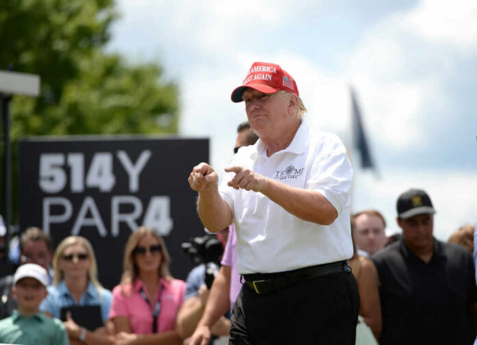 man in white shirt, red hat