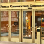 War Coverage Fallout: FCC’s Bold Move Entrance of Federal Communications Commission building door