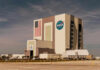 NASAs Vehicle Assembly Building with Artemis sign.