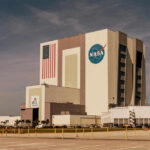 NASAs Vehicle Assembly Building with Artemis sign.