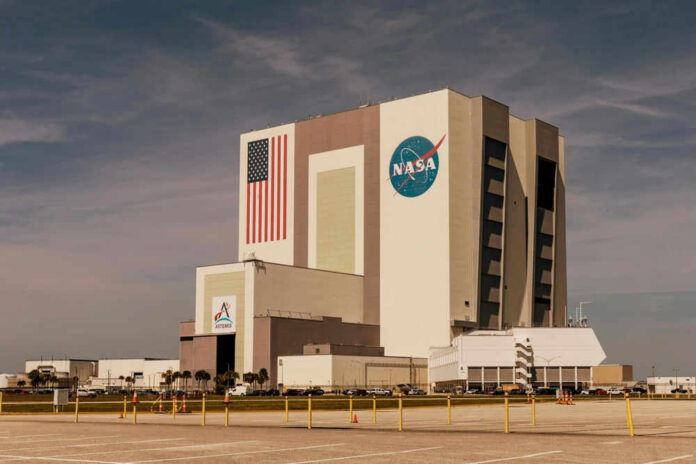 NASAs Vehicle Assembly Building with Artemis sign.