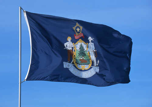 shutterstock_176428214.jpg Flag of Maine featuring the state seal and blue background