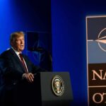 Shock: NATO Erosion Possible Without Formal Exit U.S. president delivering a speech at a NATO summit