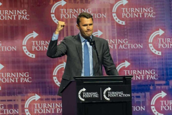 shutterstock_2557488993.jpg Speaker at a podium delivering a political speech