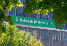 Signage of the Pittsburgh Post-Gazette on a building