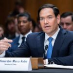 China’s BIZARRE Loophole Lets Banned Official In A government official speaking during a Senate hearing
