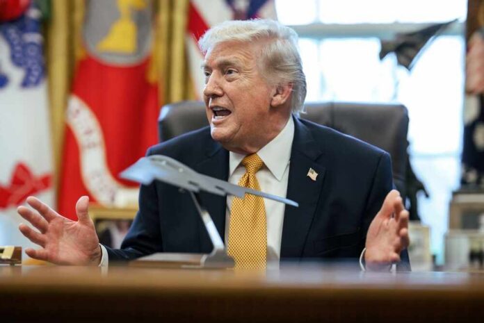 Donald Trump speaking animatedly in the Oval Office