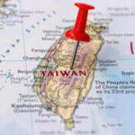 Taiwan Defense: A Pawn in Trump’s China Talks? Map with red pin on Taiwan island