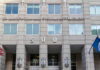 US Immigration and Customs Enforcement building entrance flags