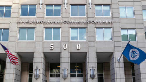 US Immigration and Customs Enforcement building entrance flags