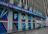 Clay Travis Steps Back as OutKick Is Folded Into Fox News Digital Fox News building exterior with ticker and barricades