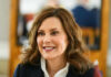 Whitmer Case Shocker — Trial Do-Over Ordered Person smiling indoors with blurred background