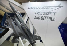 HIMARS FLEX Promises Big—What’s The Catch? Model airplanes on display with Lockheed Martin branding