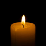 Hogan Death Theories Crumble as Police Close Case Candle flame glowing in the dark