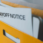 Media Bloodbath Or Spin? Daily Wire Drama A yellow folder containing a layoff notice and other documents