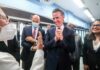 Election ‘Fix’ With a Congressional Twist Group of people engaged in a lively discussion during a public event