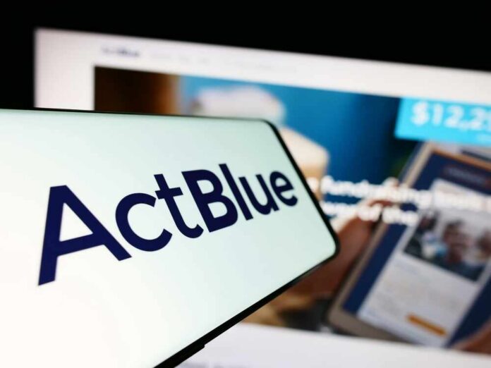 Stuttgart,,Germany,-,08-20-2023:,Mobile,Phone,With,Logo,Of,Fundraising Close-up of a mobile device displaying the ActBlue logo with a blurred background of a fundraising website