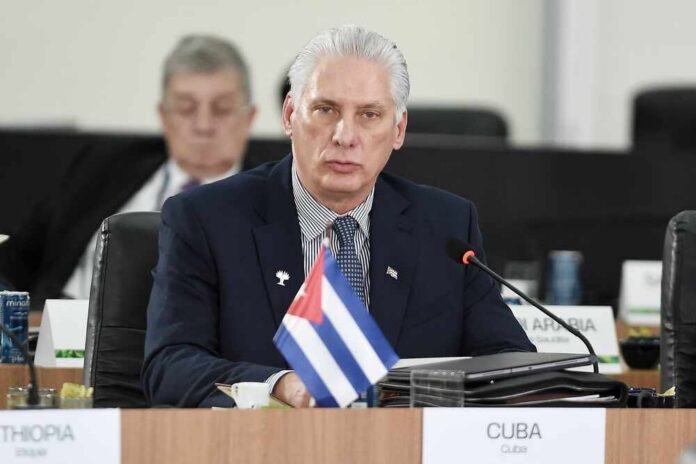 Rio,De,Janeiro,,Brazil,,July,6,,2025.,President,Of,Cuba, Cuban representative at a political meeting with a flag on the table