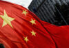 VPN Use Now a Liability in China Close-up of the Chinese flag waving in the wind