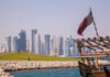 Trump’s $1.2T Qatar Deal—Real or Hype? Doha skyline with Qatar flag and dhow boat