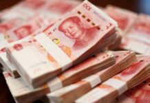 Stacks of Chinese banknotes arranged neatly