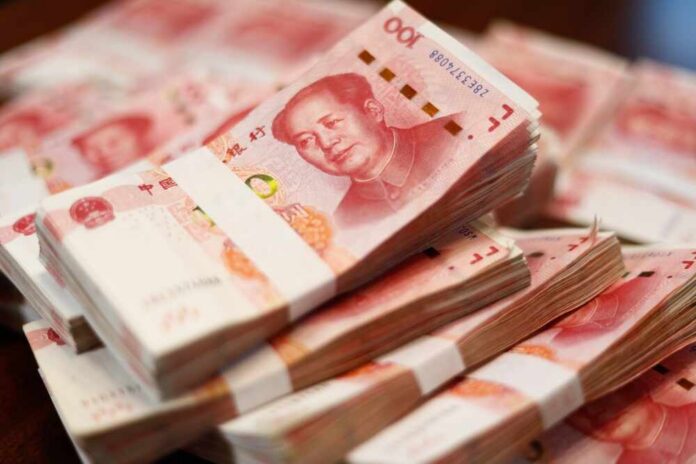 Stacks of Chinese banknotes arranged neatly
