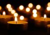 Tea light candles with warm glowing flames
