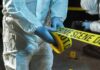 NJ Mom Butchered—Killer Still Out There forensic investigators unrolling yellow barrier tape at night