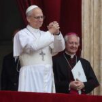 Celibacy Cracks? Pope-Backed Bishop Stirs Fury Pope giving a blessing from a balcony