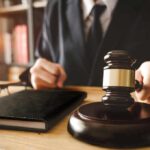 Americans Snubbed—OpenAI Forks Over $3.2M Judge with gavel striking sound block