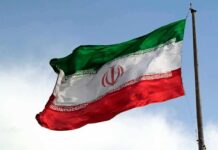 Declassified Shock: Washington Armed Tehran Iranian flag waving on a pole