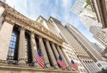 Peace Hype Ignites Wall Street New York Stock Exchange facade with columns and American flags