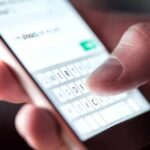 Cover-Up Vibe: Chief’s ‘Delete It’ Push Hand typing on smartphone touchscreen keyboard