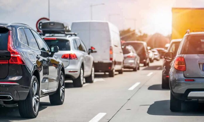 Traffic jam with cars and vans on a multi-lane highway