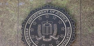 FBI seal mounted on a stone wall