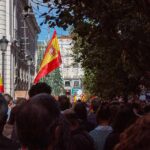 Missing Table Sparks Morocco Payout Uproar Crowd with Spanish flags in a city street