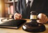 Underage Twist In Explosive Influencer Case Judge with gavel striking sound block