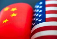 Chinese and American flags side by side