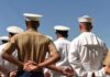 Reload Crisis Exposes Naval Weakness sailors and marines standing in formation with hands behind backs