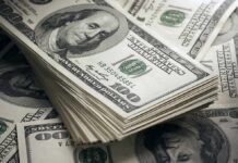 Stack of US 100 dollar bills