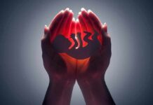 Andorra’s Abortion Gambit Tests Rome Hands cupping a glowing fetal silhouette