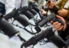 Judges Gut Costly Handgun Middleman Scheme Handguns on display at a store counter