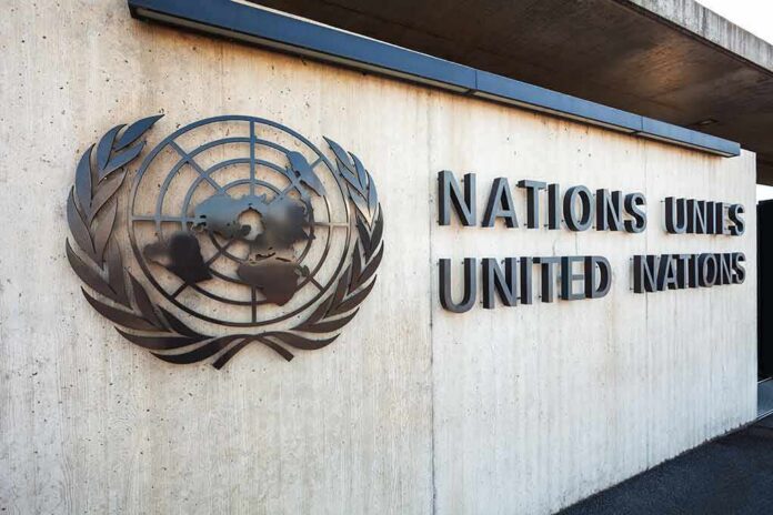 United Nations emblem and signage on a concrete wall